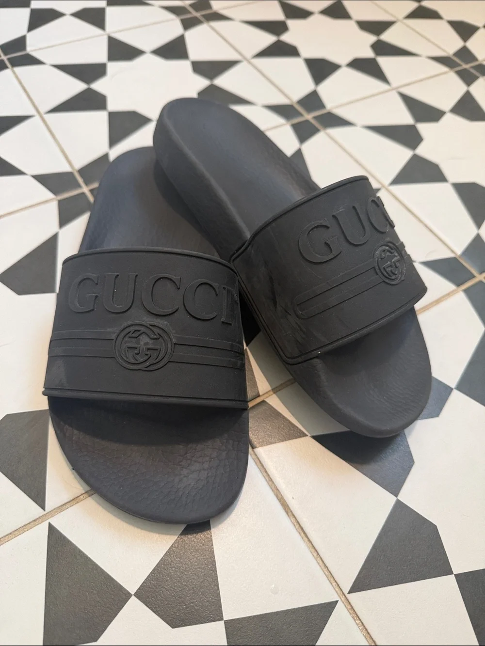 Gucci Black Embossed Logo Rubber Slide Sandals